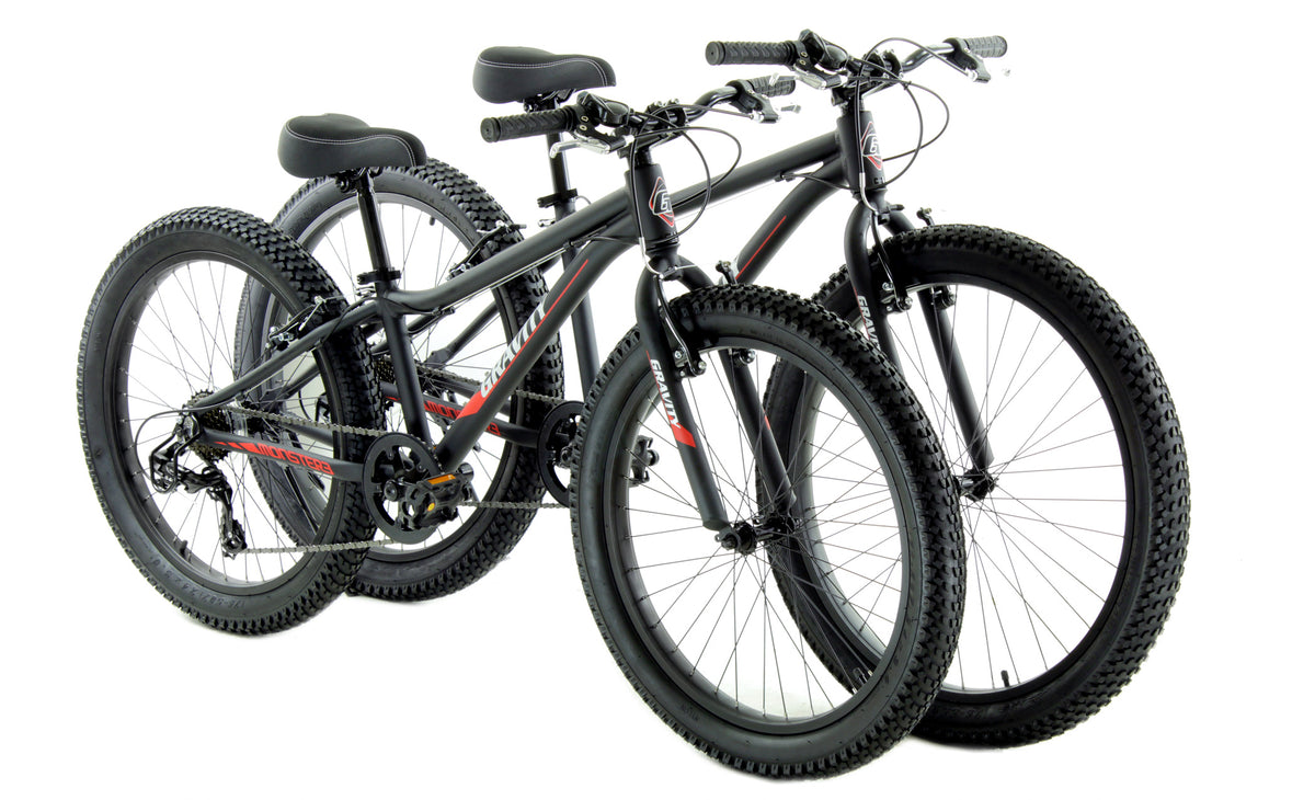 Gravity Monster3 fat-tire bicycles in a three-quarter group view